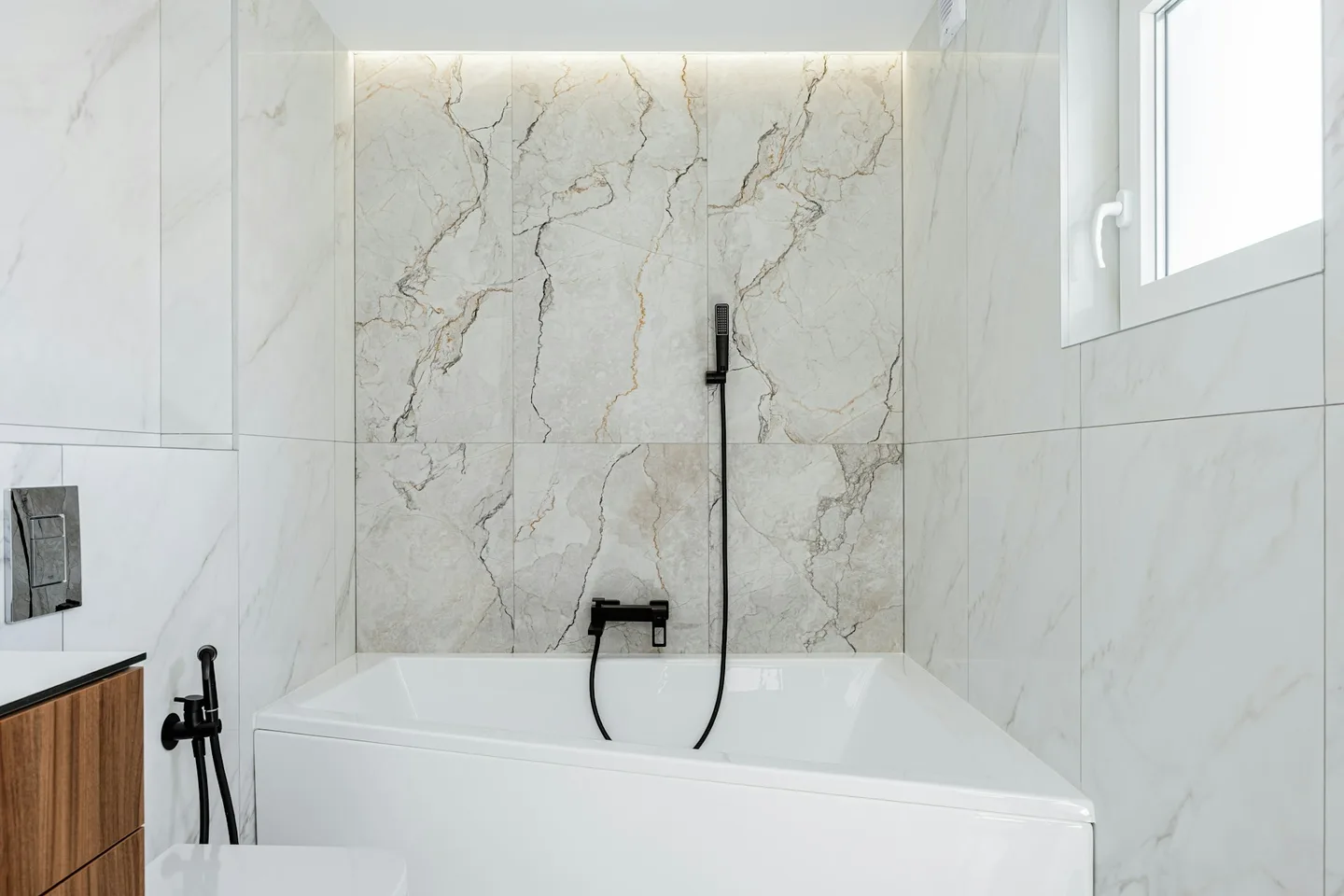 Elegant marble bathroom installation by APL Plumbing